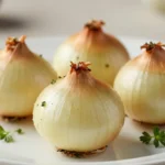 Oignons farcis cuits au cookeo, un plat savoureux et réconfortant.