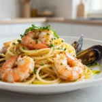 Délicieuse recette de pâtes aux fruits de mer préparée avec le Cookeo pour un repas savoureux et rapide.
